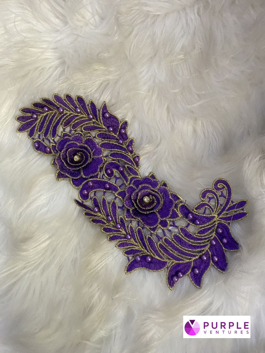 Purple flower + pearls. Gold lined